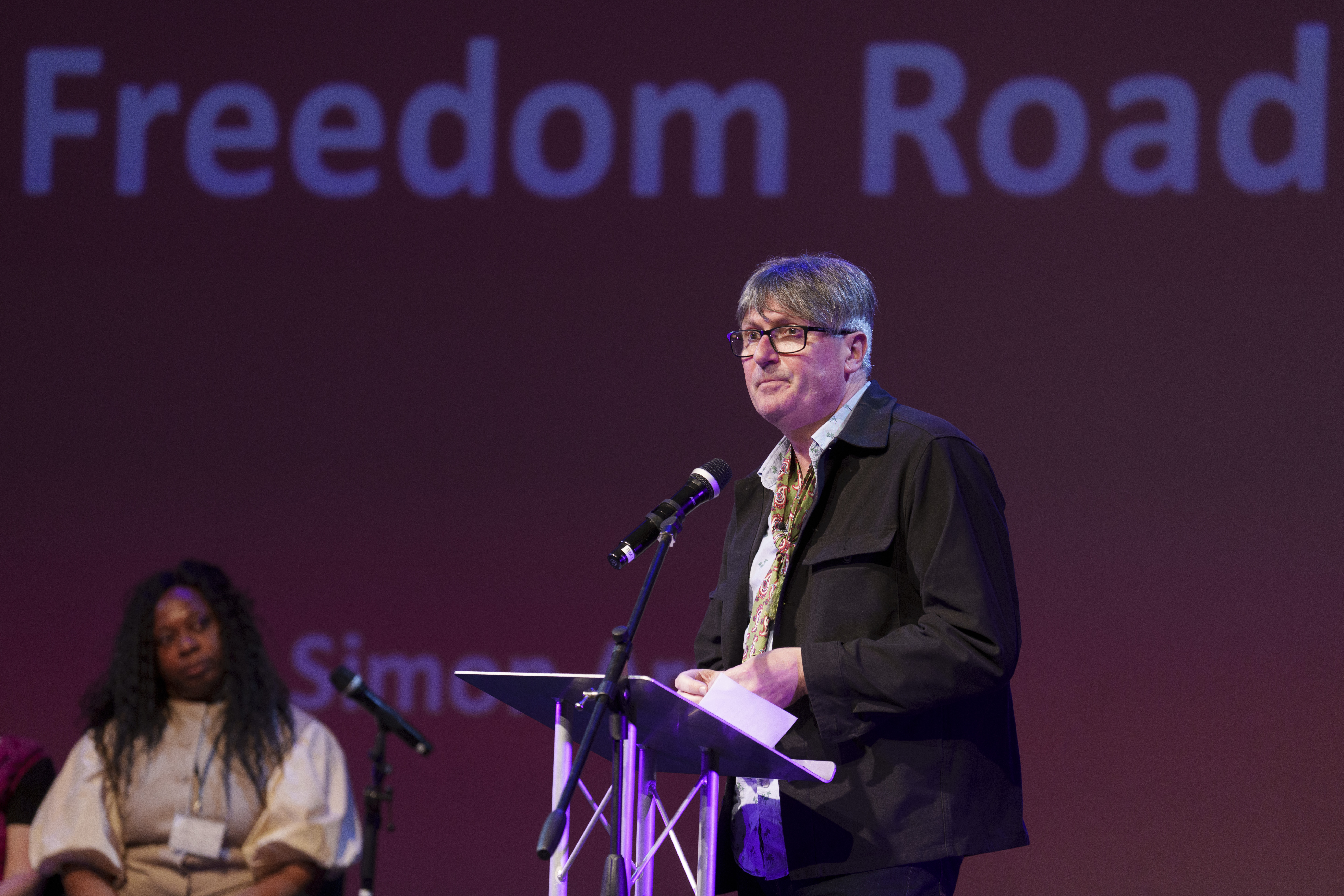 Poet Laureate, Simon Armitage, delivers the first reading of his original poem, ‘Freedom Road’, at the ‘Our Freedom: Then and Now’ launch event, led by Future Arts Centres, at Contact Theatre in Manchester.